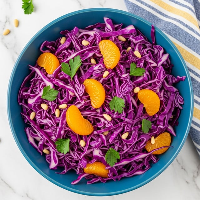 Purple Cabbage Salad with Mandarin Oranges, Cranberries, and Pine Nuts Recipe