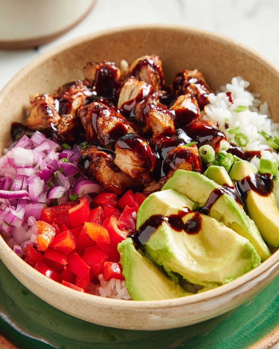 The image shows a beige bowl filled with four main layers arranged side by side: dark brown grilled chicken pieces with a slightly glossy texture, white rice with a soft and fluffy appearance, finely chopped purple onions with a crisp texture, and bright red diced bell peppers that look fresh and juicy. In front, there are chunky slices of creamy light green avocado topped with thick dark brown sauce drizzled over the top. The bowl sits on a white marbled surface, with a hint of a green ceramic plate underneath partially visible. Photo taken with an iphone --ar 4:5 --v 7
