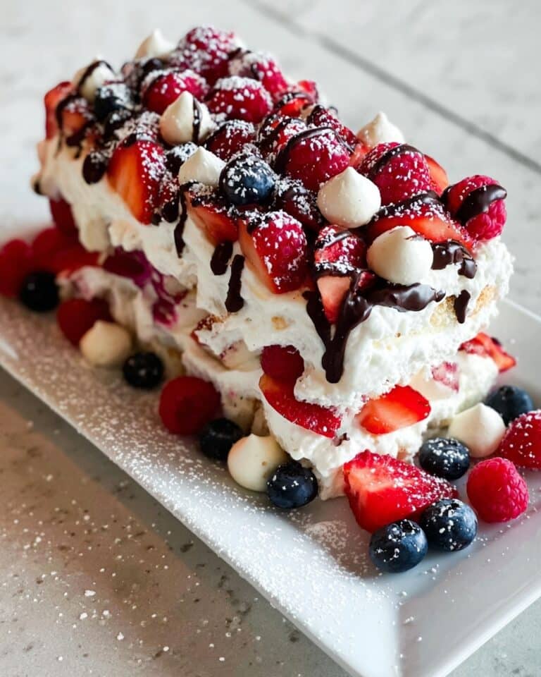 Meringue Cake with Lemon Curd Cream and Berries Recipe