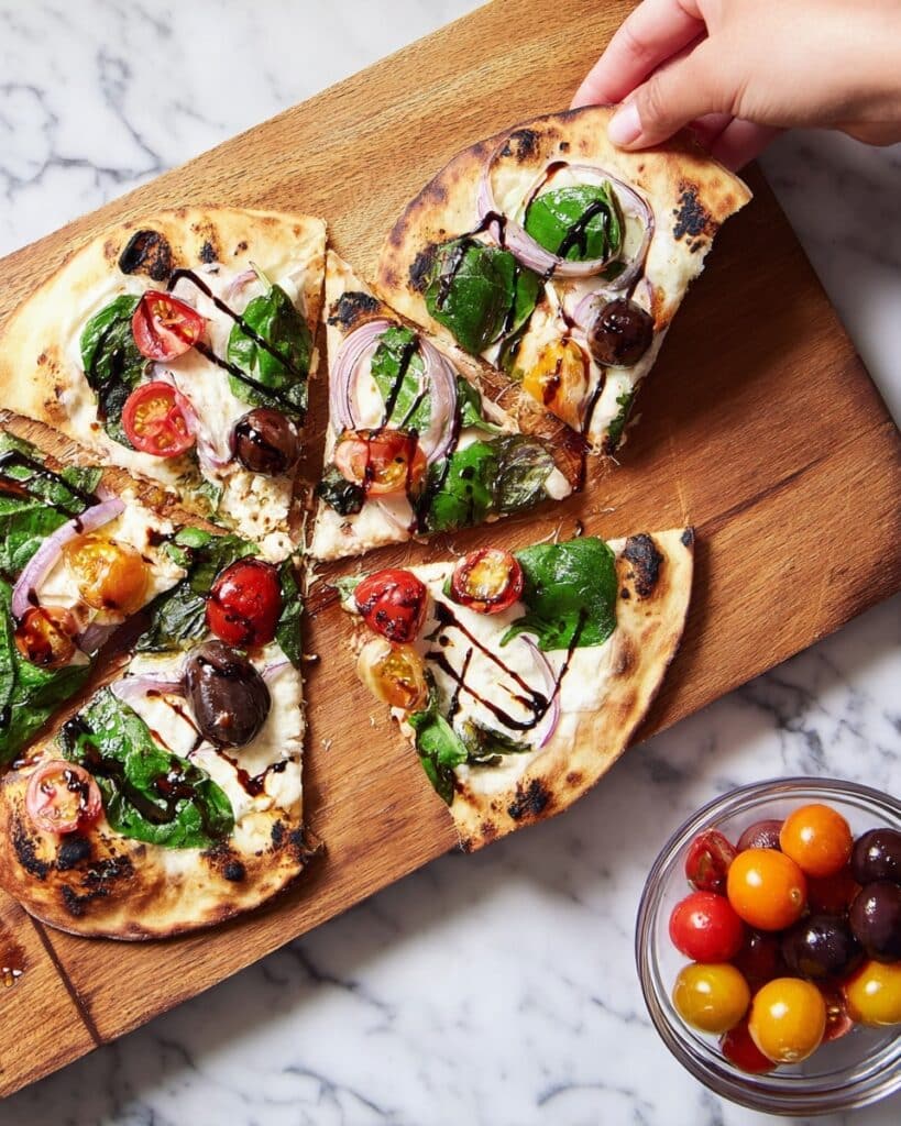 Flatbread Pizza with Tomatoes, Red Onion, and Arugula Recipe