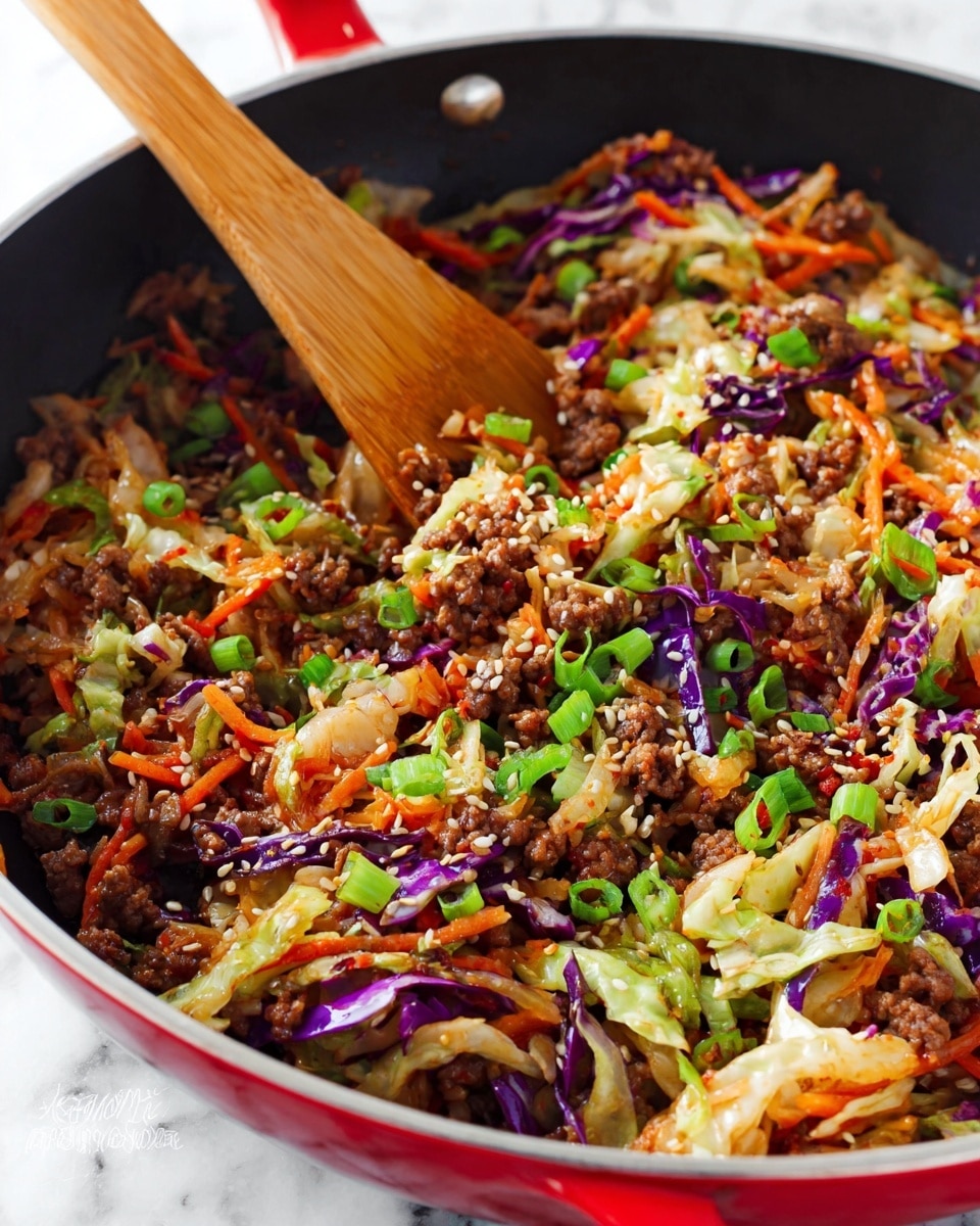 This image shows a close-up of a cooked stir-fry dish inside a black pan with a red handle sitting on a white marbled surface. The dish has several layers and colors: browned ground meat chunks, thin strips of orange carrots, shredded white and purple cabbage, and chopped green onions scattered on top. White sesame seeds are sprinkled over the whole mixture, adding texture. A wooden spatula is resting inside the pan, partly covered by the ingredients, mixing the colorful, fresh-looking layers. The overall look is vibrant and appetizing with a mix of cooked and fresh textures. photo taken with an iphone --ar 4:5 --v 7
