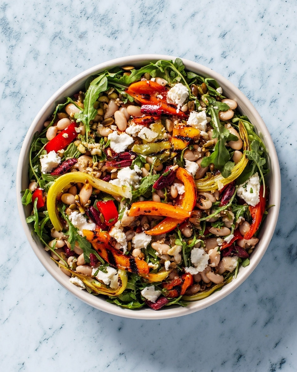 A top view of a mixed salad in a white bowl placed on a white marbled surface. The salad has many layers including green arugula leaves that add a fresh texture, white beans scattered throughout giving a smooth and soft appearance, and chunks of red bell pepper providing bright color contrast. There are strips of roasted orange carrots and charred rings of yellow-green grilled leek adding depth and a slightly crispy look. Small pieces of white cheese are spread over the top. The layers combine to create a colorful, fresh, and textured salad bowl. photo taken with an iphone --ar 4:5 --v 7