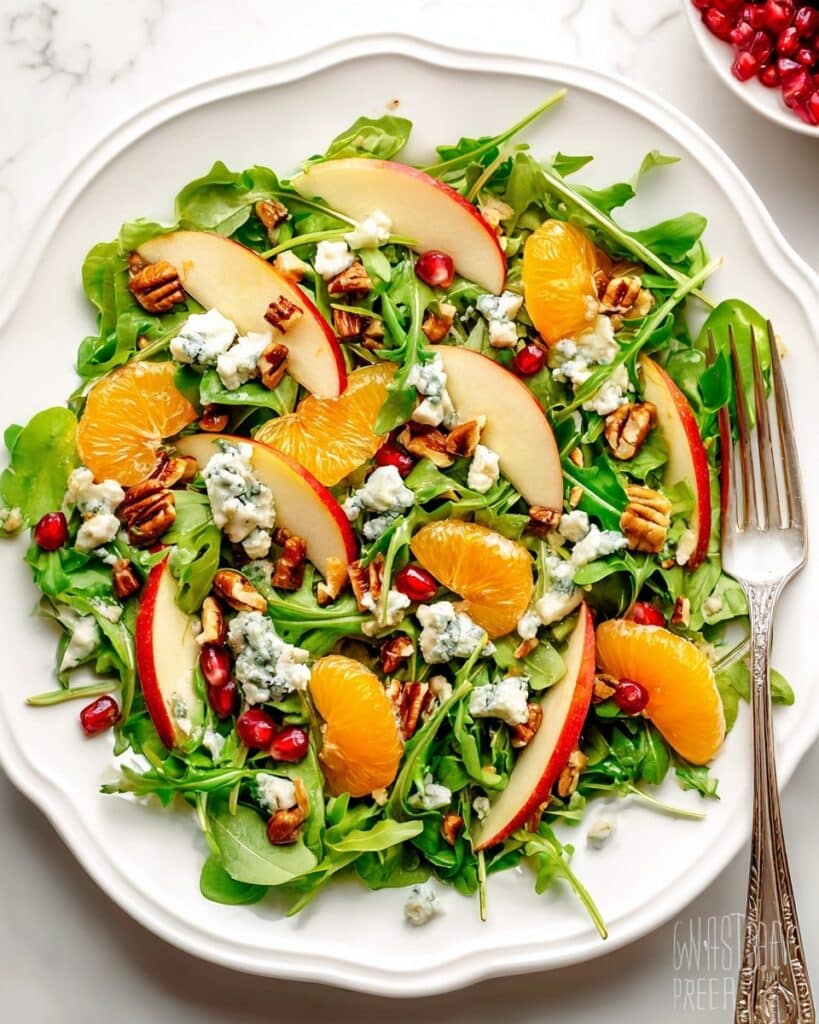 Christmas Salad with Mandarin Oranges, Apple, Pomegranate, and Blue Cheese Recipe