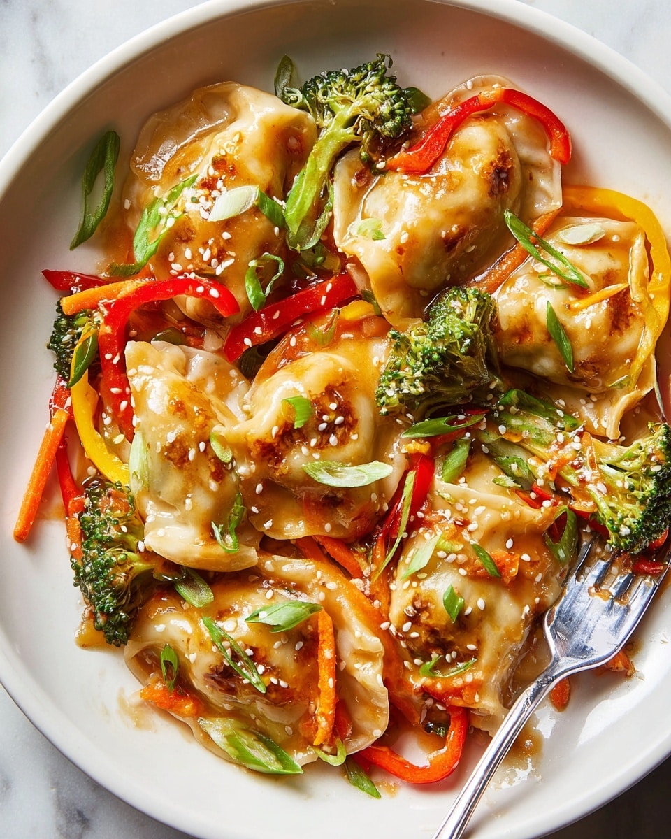 A white plate filled with about ten golden-brown dumplings coated in a glossy, light brown sauce, mixed with bright green broccoli florets, thin strips of red and yellow bell peppers, and shredded orange carrots. The dish is sprinkled with small white sesame seeds and chopped green onions, adding bursts of color and texture. On the right side of the plate, a metal fork is lifting one dumpling revealing a little filling inside. The plate sits on a white marbled surface. Photo taken with an iphone --ar 4:5 --v 7