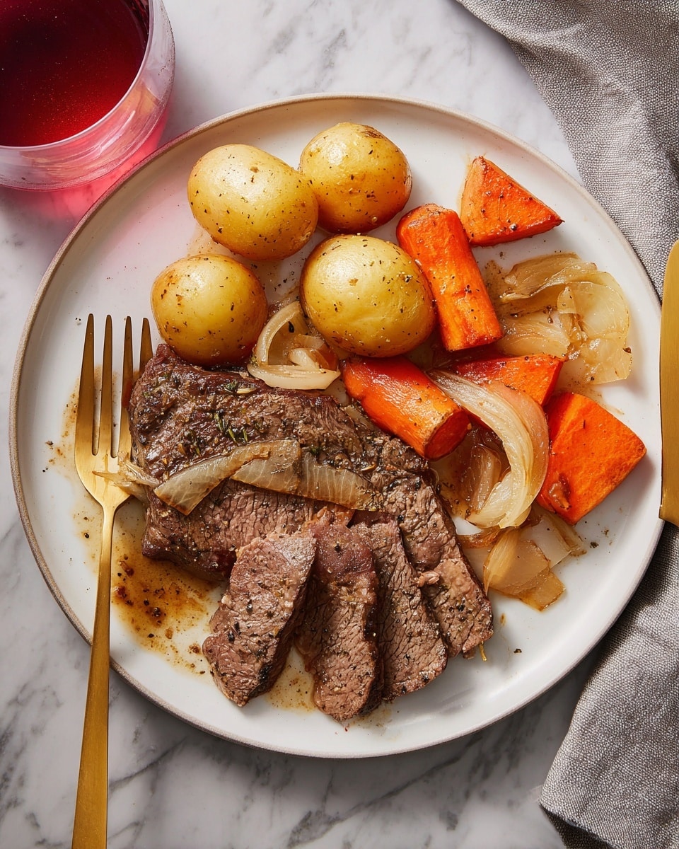 A white plate holds a cooked steak as the bottom layer, showing a browned, slightly peppered texture with a cut piece near the front. On top and to the right are several cooked vegetables: round potatoes with a golden skin, orange carrot slices, and triangular sweet potato pieces, all glistening with a bit of sauce. Thin cooked onion slices with a translucent, soft look are spread over the vegetables and steak. A golden fork is placed at the bottom left of the plate with its tines touching the steak, and a golden knife lies on the right edge of the plate. In the upper left corner, part of a glass with a red drink is visible. The plate is set on a white marbled surface. photo taken with an iphone --ar 4:5 --v 7
