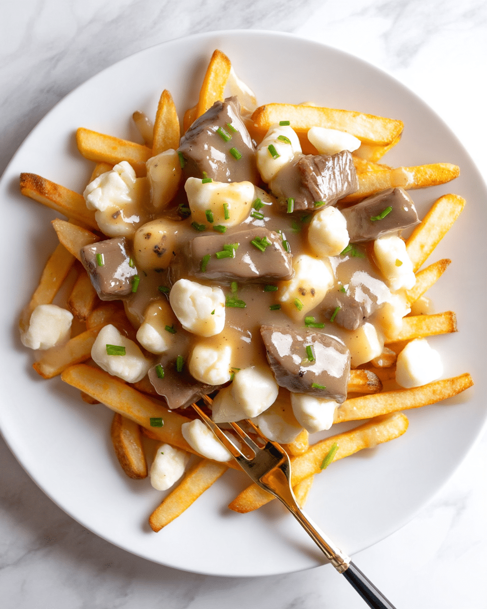 A white plate holds a layered dish starting with a base of golden-brown fries spread evenly. Scattered over the fries are white, soft cheese curds. On top of this, a thick, light brown gravy covers the dish, with several chunks of tender brown meat partially visible through the gravy. Small green bits of chopped chives are sprinkled across the top, adding a pop of color. A fork with a gold and black handle rests on the plate, some gravy and a piece of meat speared by its tines. The plate is placed on a surface with a white marbled texture. photo taken with an iphone --ar 4:5 --v 7