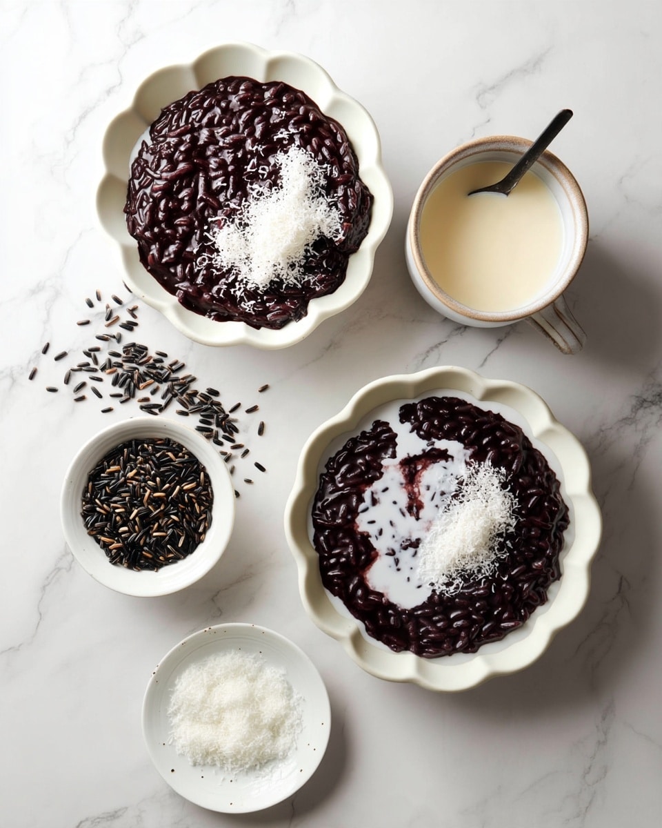 There are two white scalloped bowls filled with dark purple sticky rice pudding topped with a layer of white coconut milk pouring over in uneven patches and a sprinkle of white shredded coconut on one side of each bowl. To the left, there is a small white bowl containing uncooked black rice grains scattered a bit outside the bowl. To the right, there is a white cup filled with coconut milk, with a black spoon inside. Near the bottom edge, there is another small white bowl filled with white shredded coconut. All items are placed on a white marbled surface. photo taken with an iphone --ar 4:5 --v 7